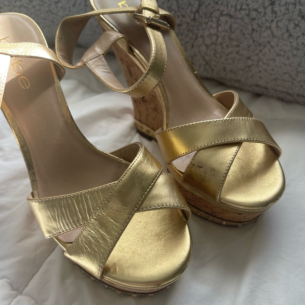 BEBE gold wedges size 7
